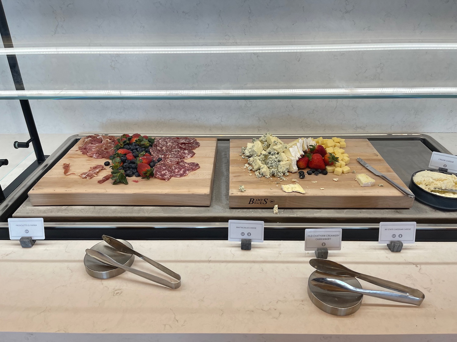 a cutting boards with different types of food on them