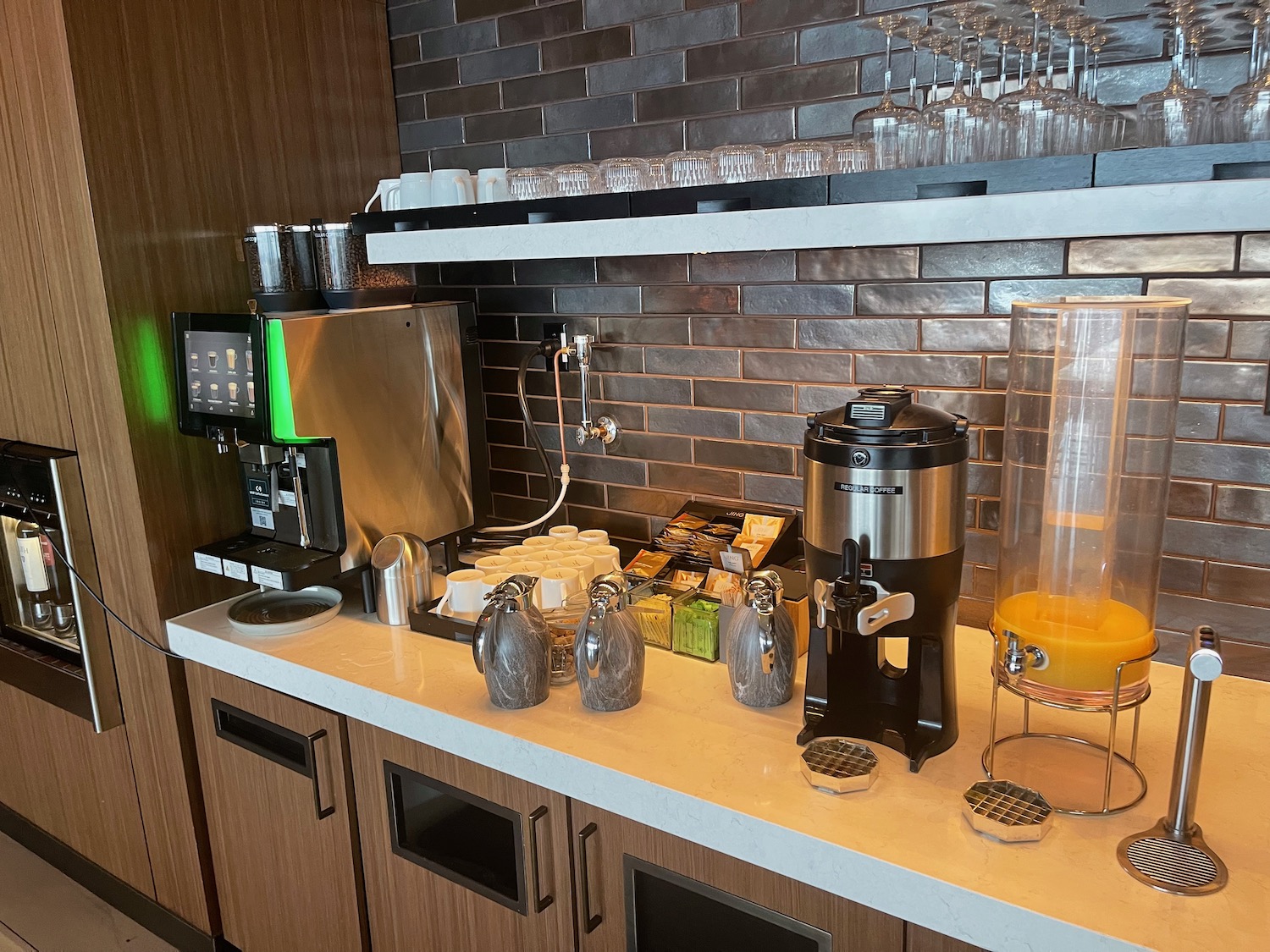 a coffee machine and juice dispenser