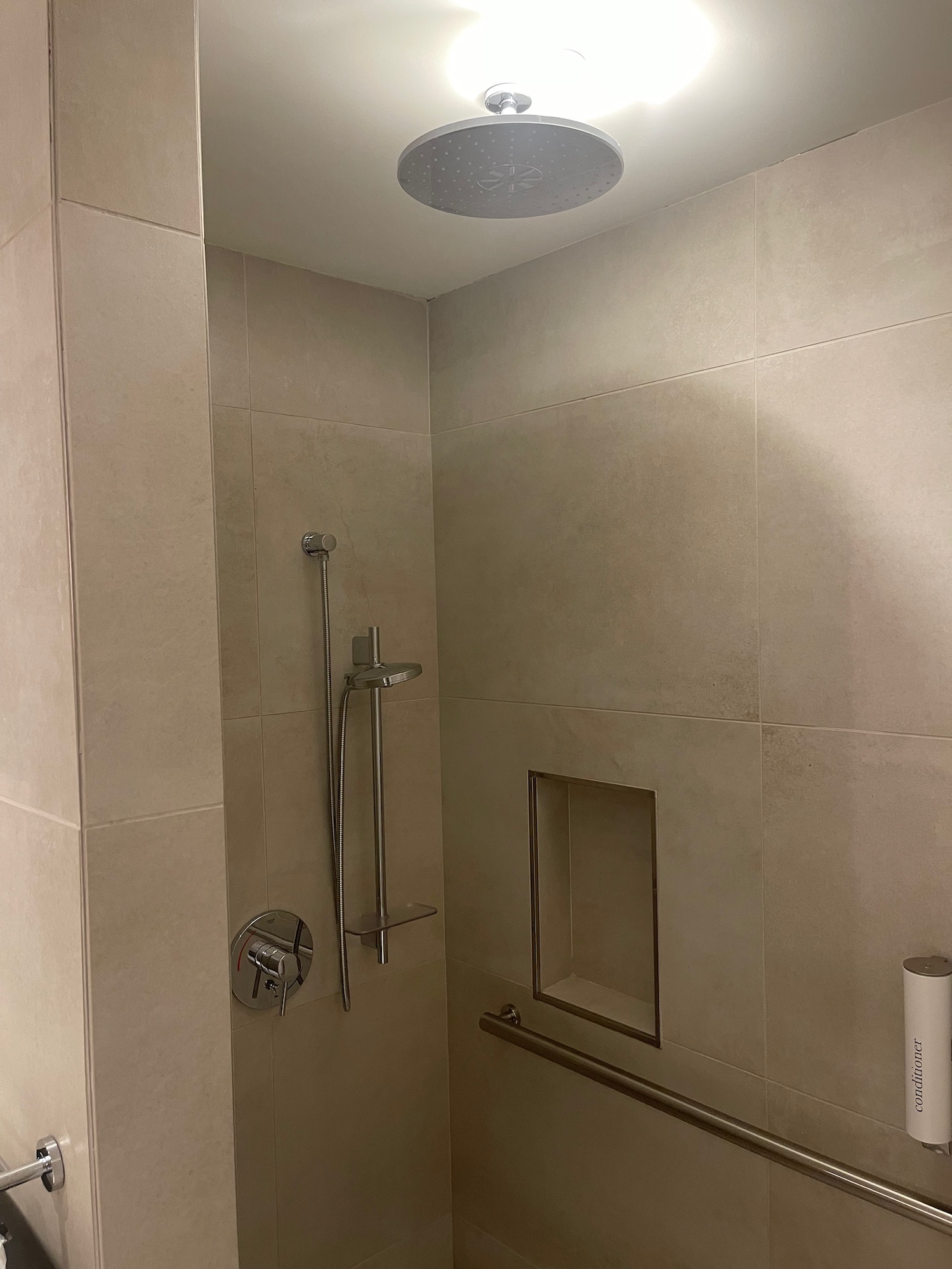 a shower with a shower head