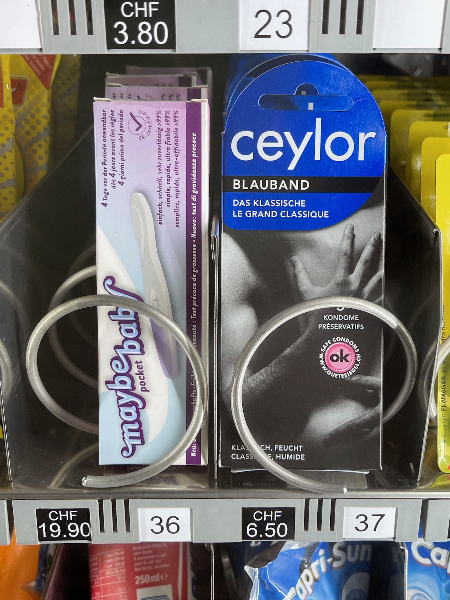 a shelf with a few boxes of products