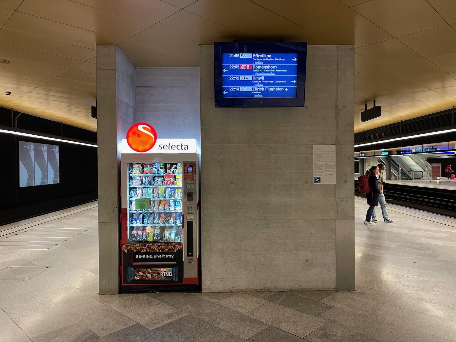 a vending machine in a train station