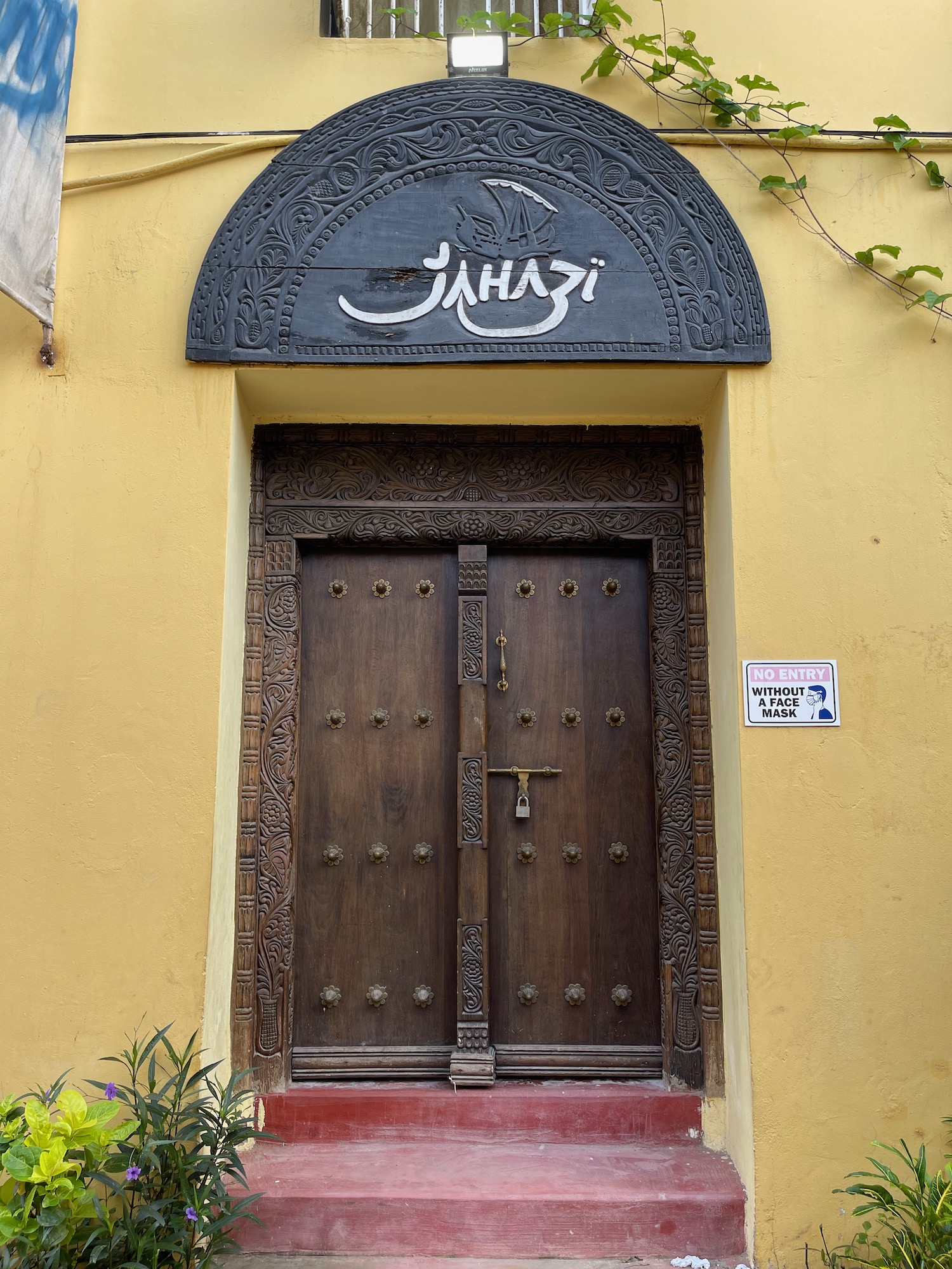 a door with a sign above it