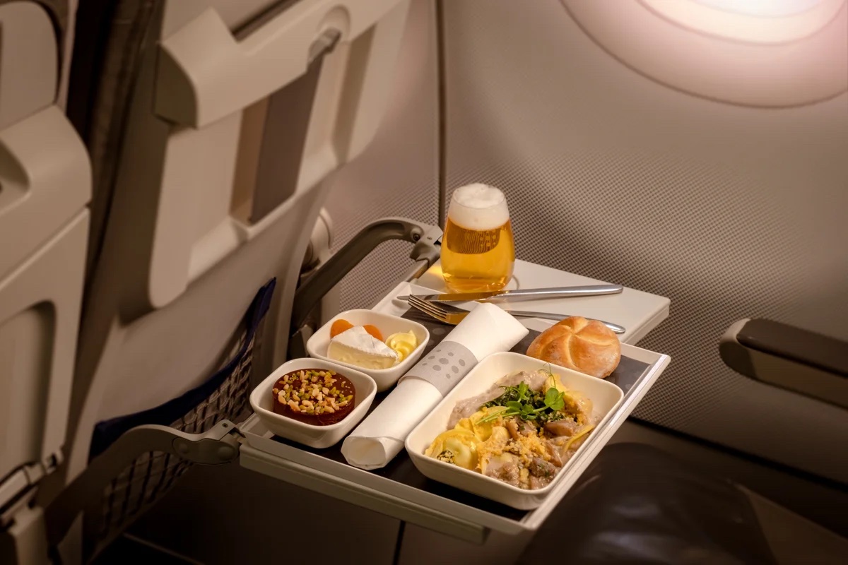 food on a tray on a plane