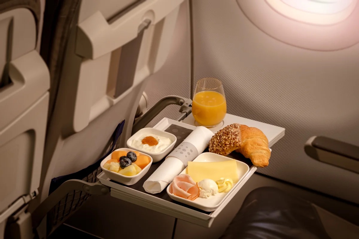 a tray of food on a plane