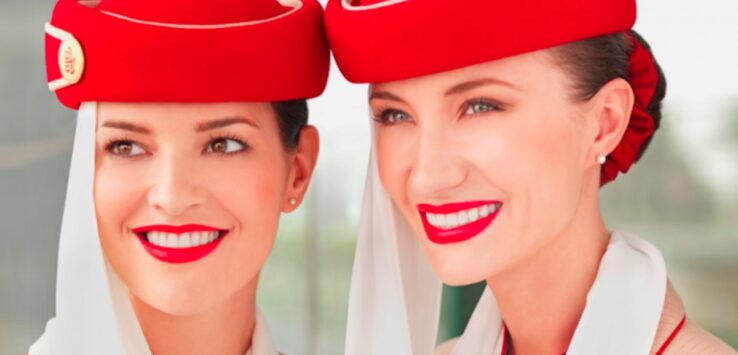 a couple of women wearing red hats