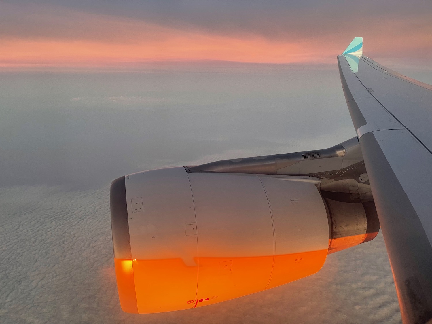 an airplane wing in the sky