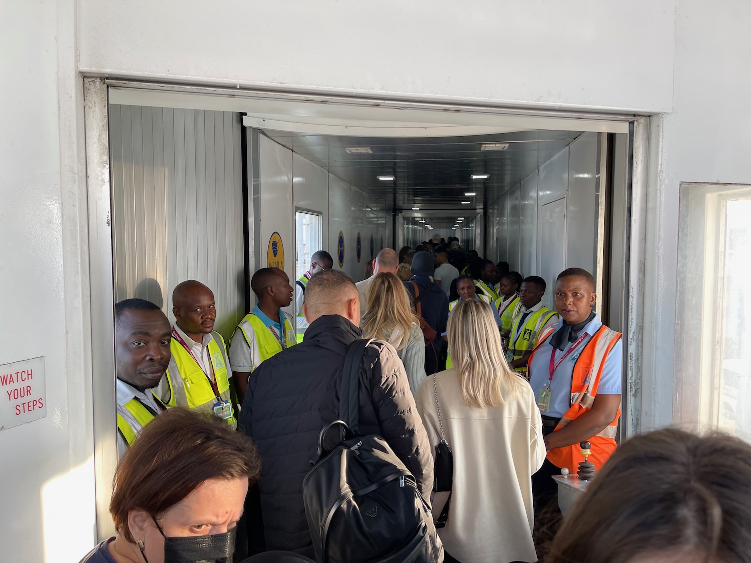 a group of people in a hallway