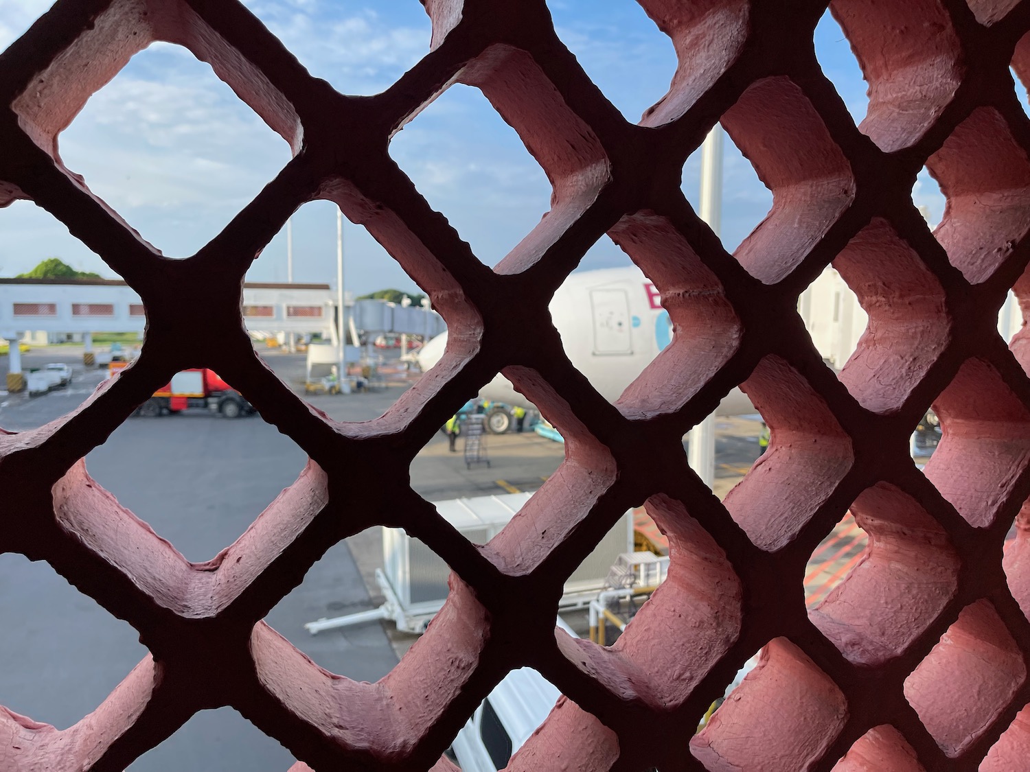 a red fence with a grid