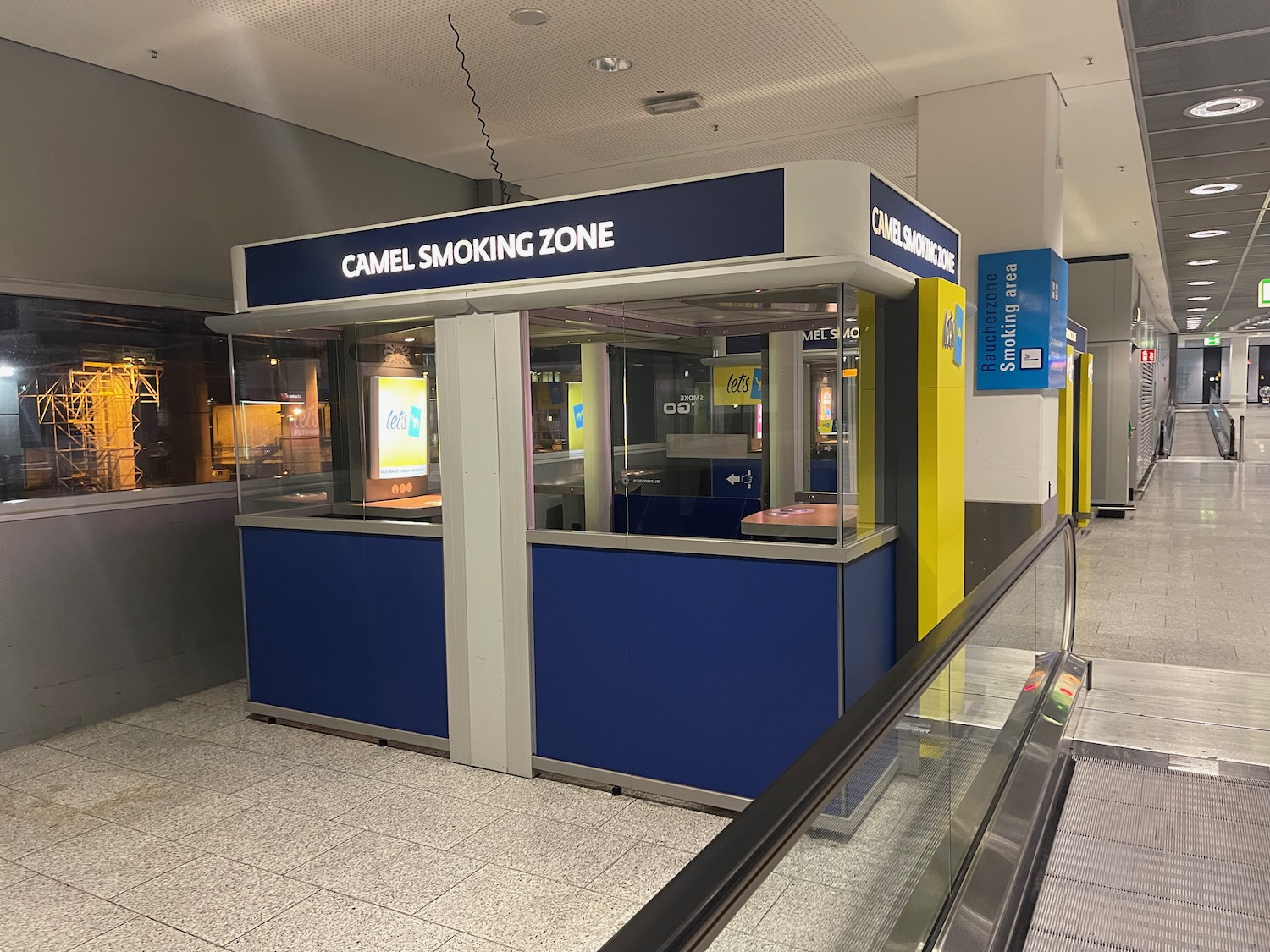 a blue and yellow sign in a building