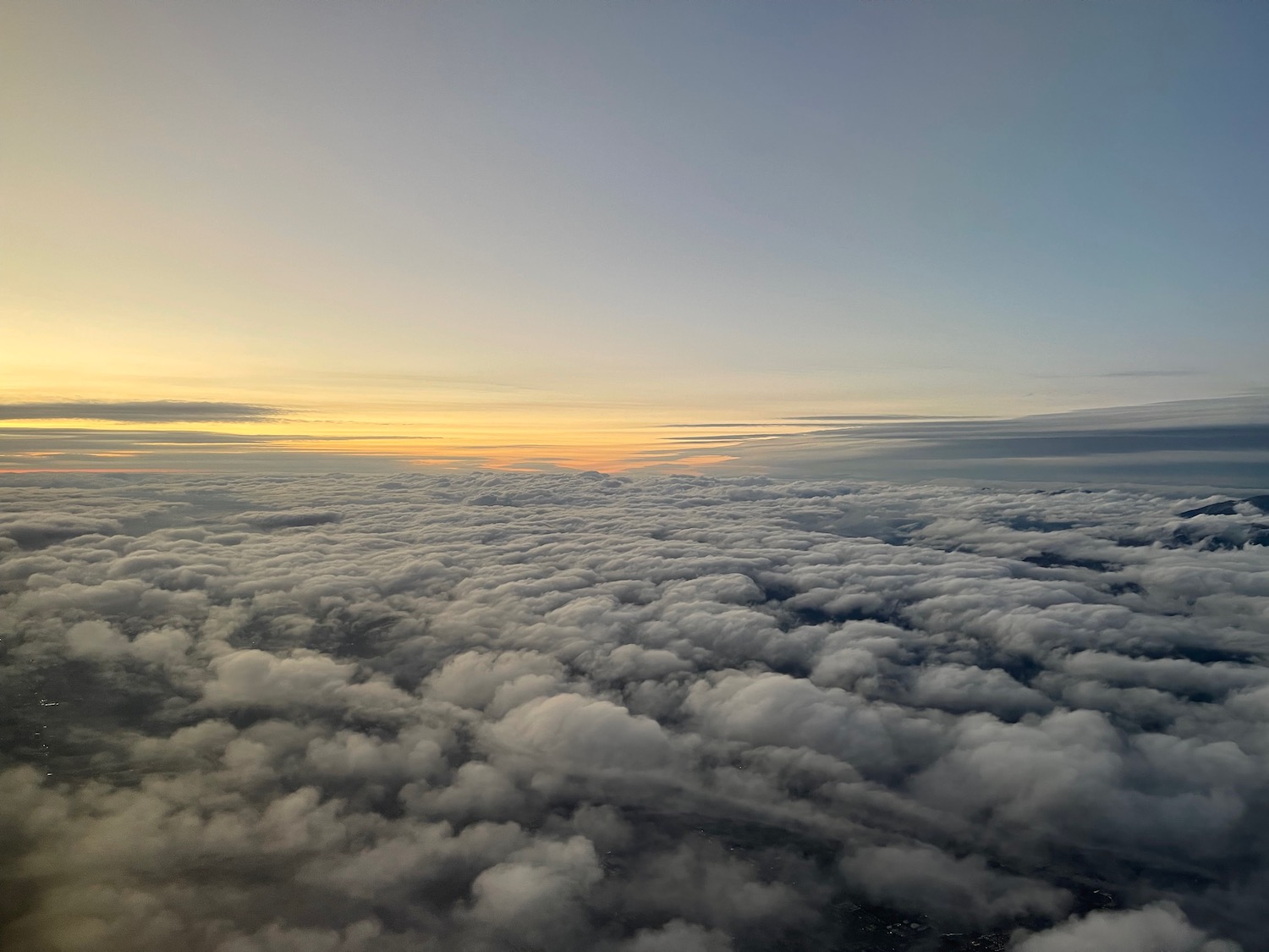 clouds and sky with sun setting