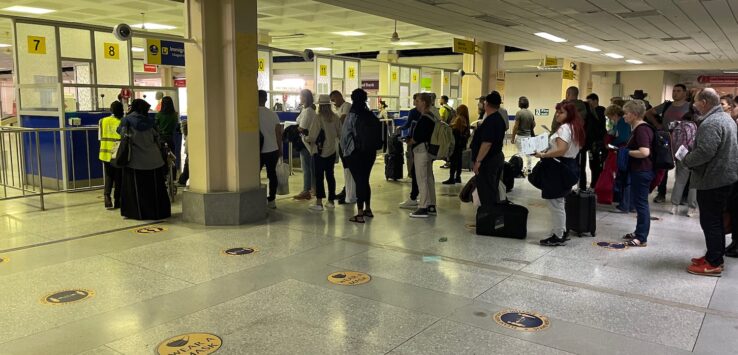 a group of people standing in a line