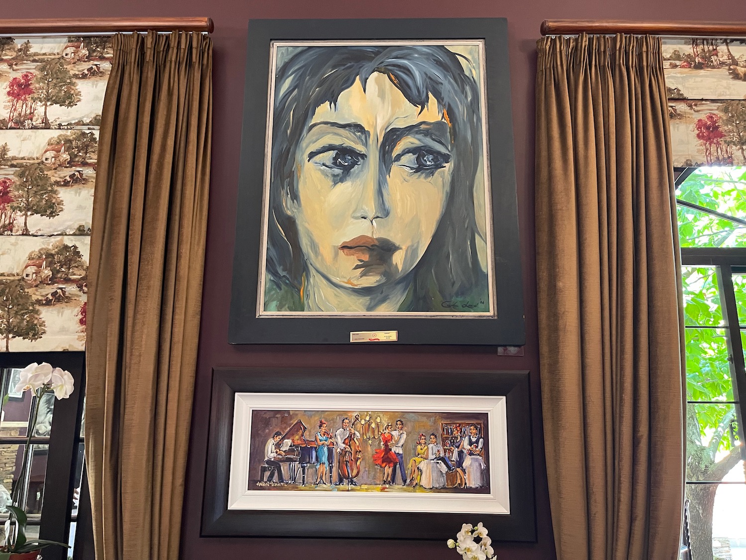 a framed art on a wall