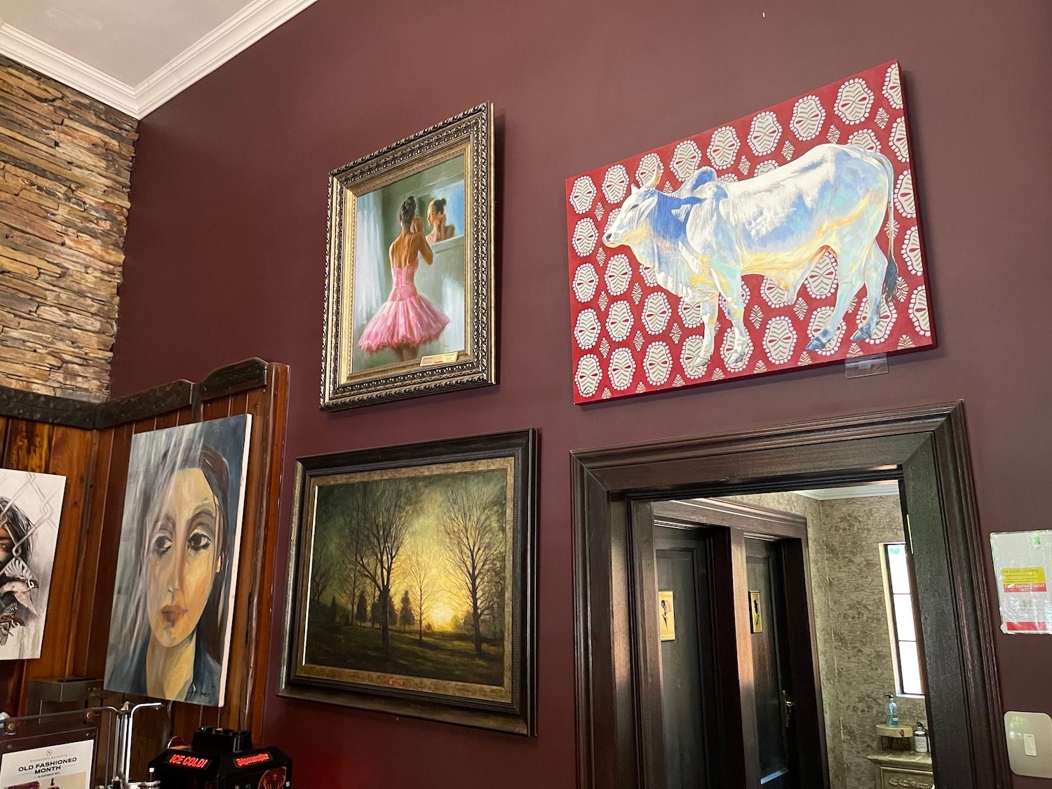 a wall with paintings on it