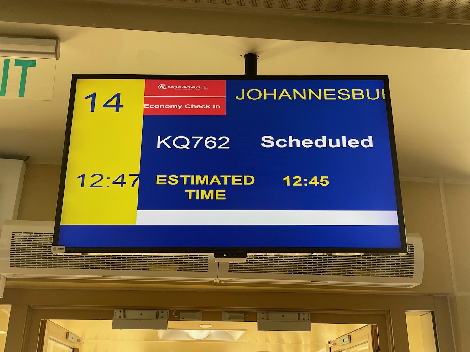 a screen with a blue and yellow sign
