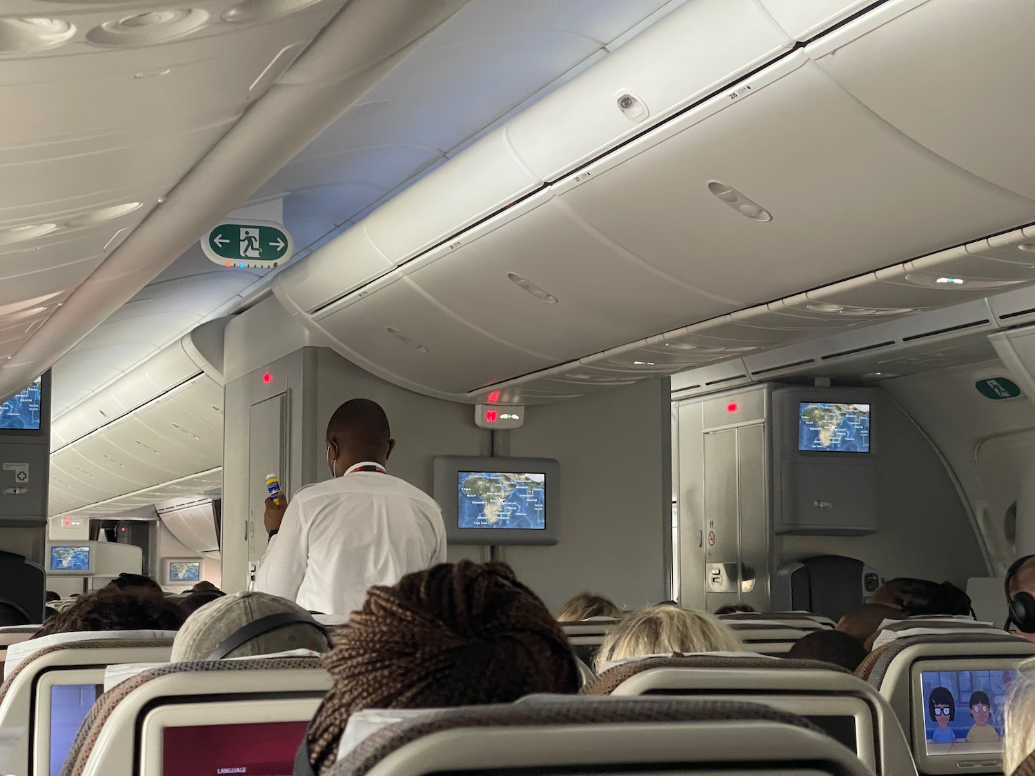 a group of people sitting in an airplane