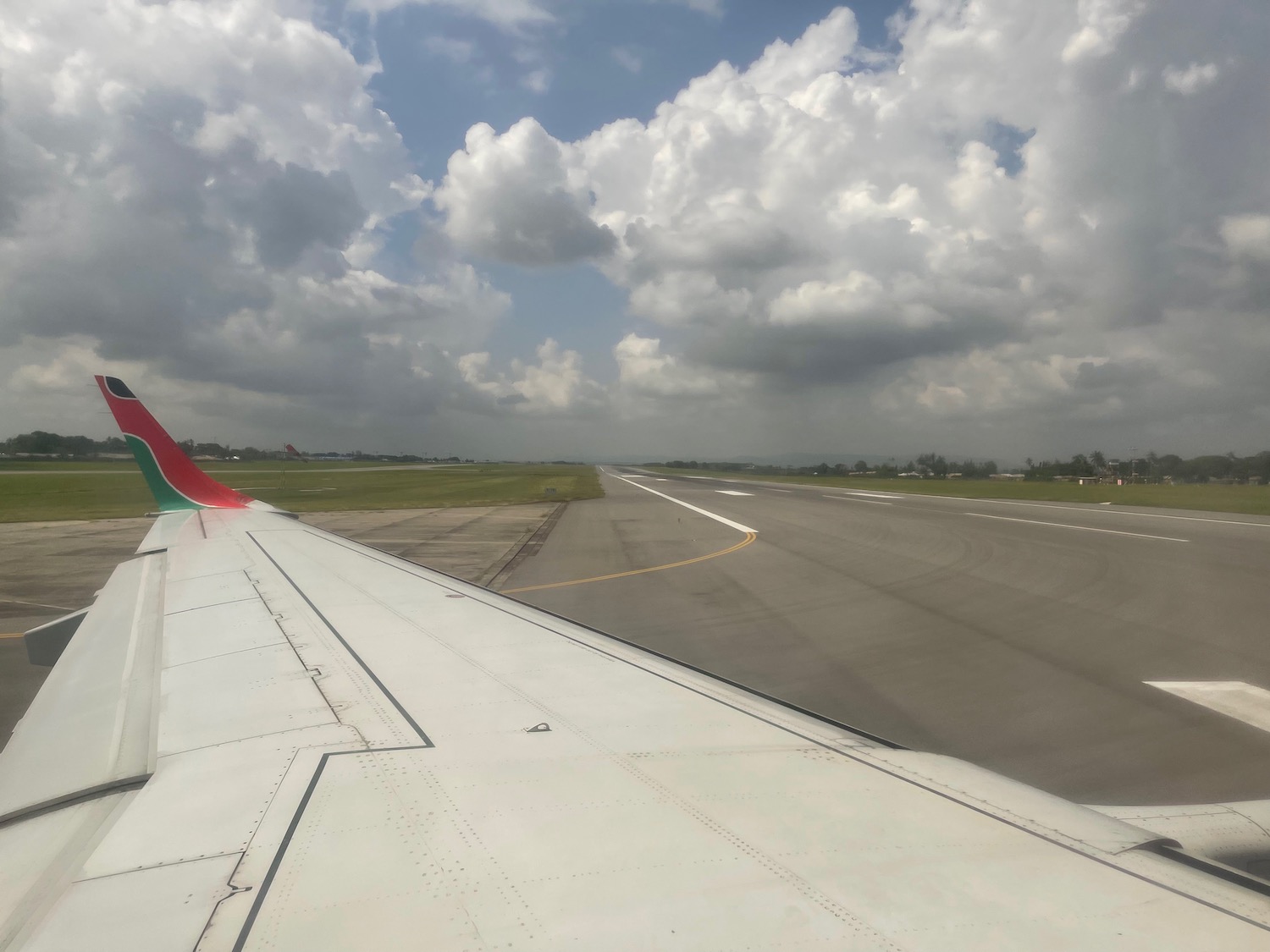 an airplane wing on a runway