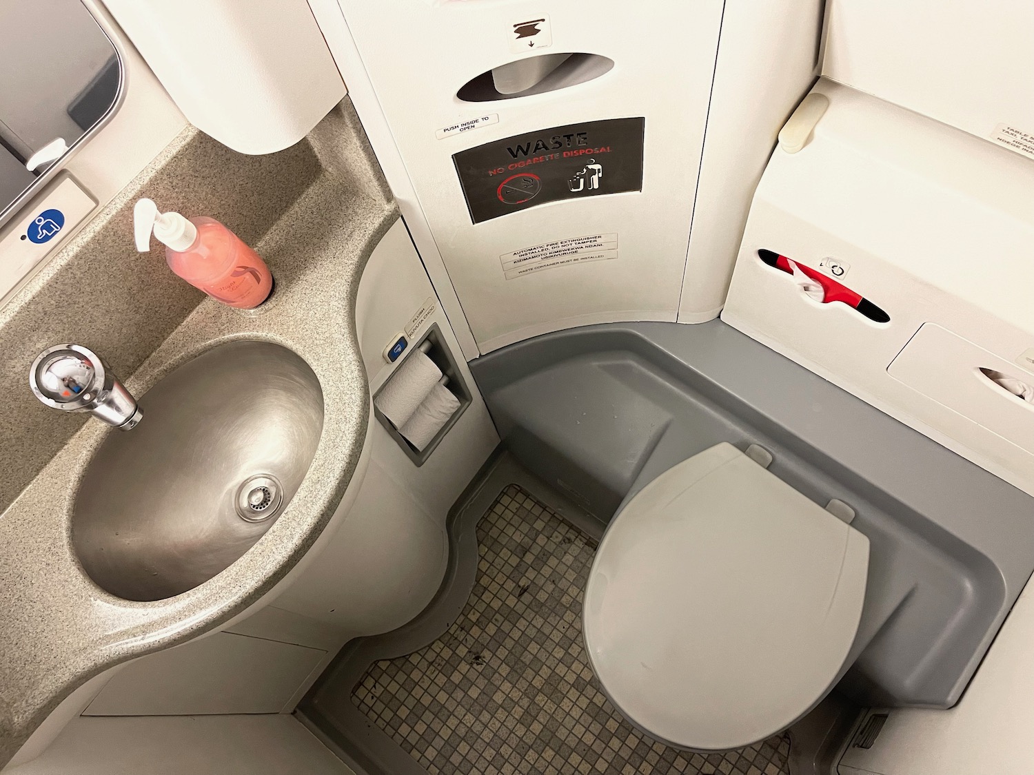 a sink and toilet in a plane