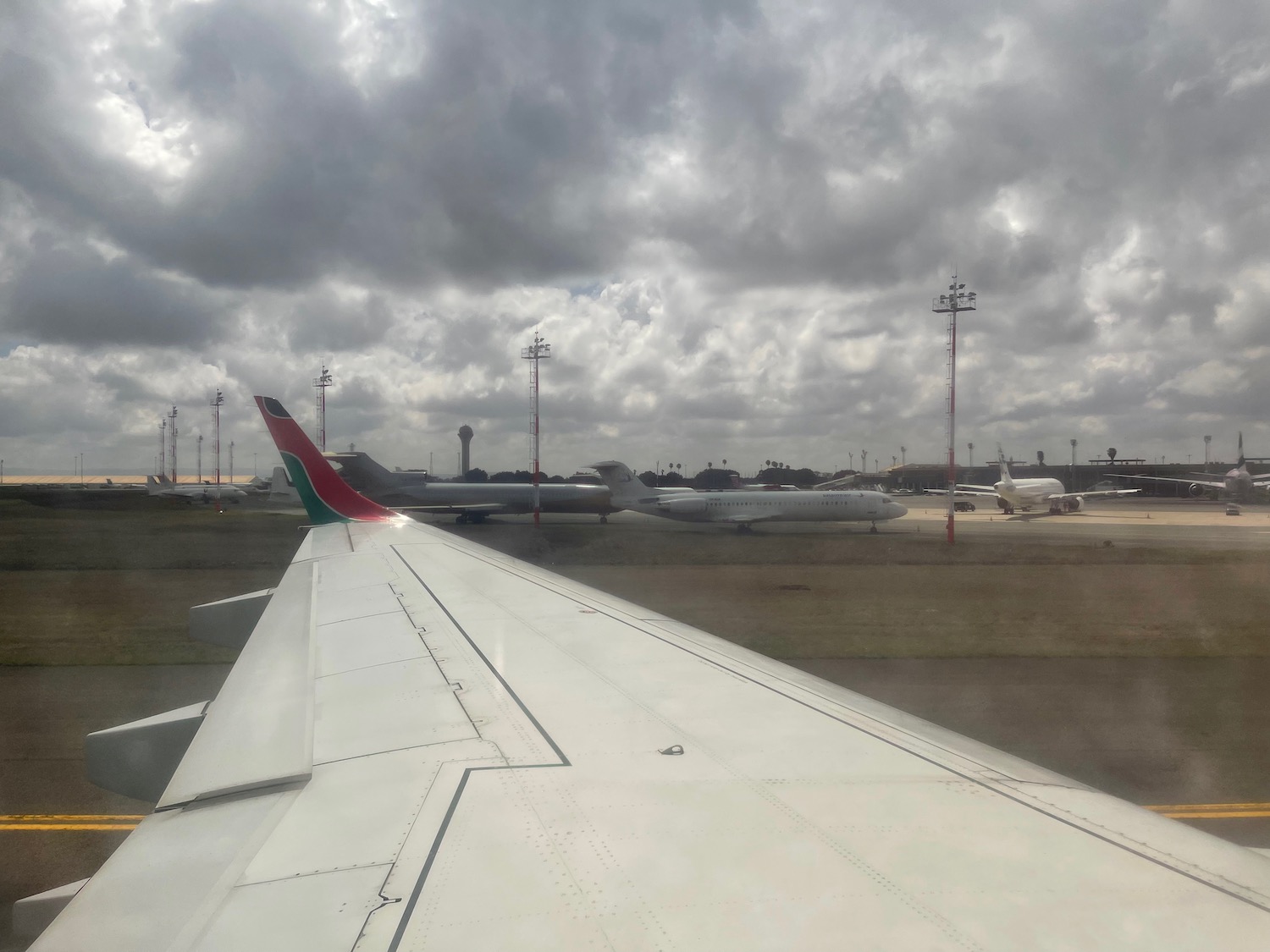 an airplane wing on a runway