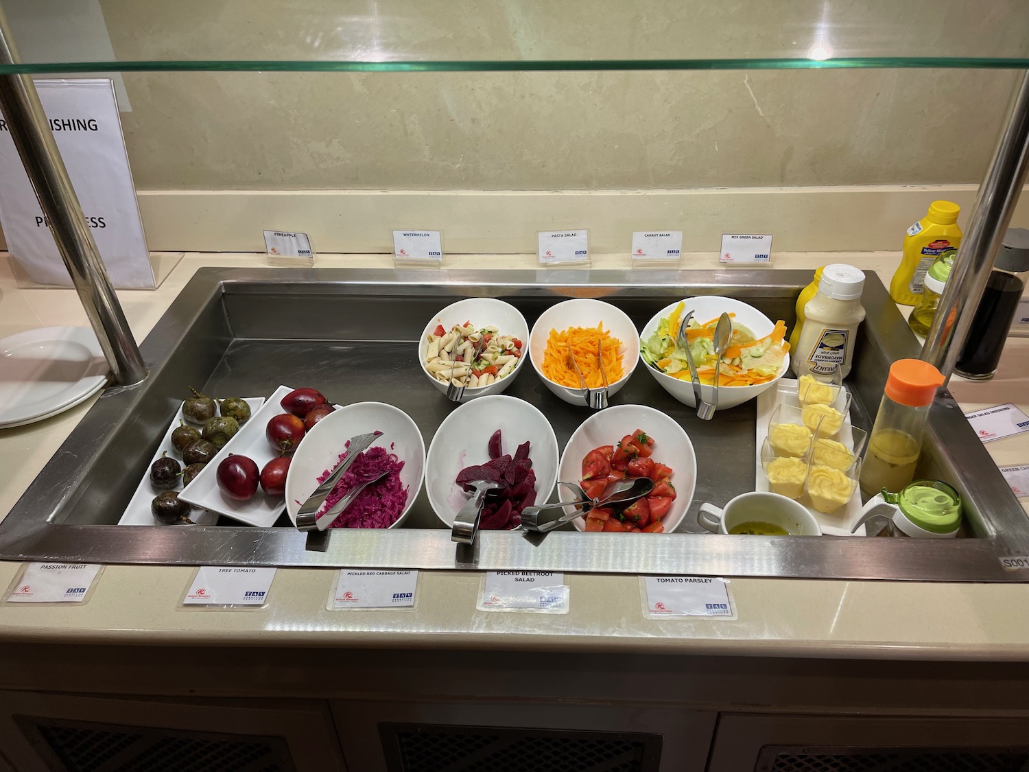 a counter with bowls of food