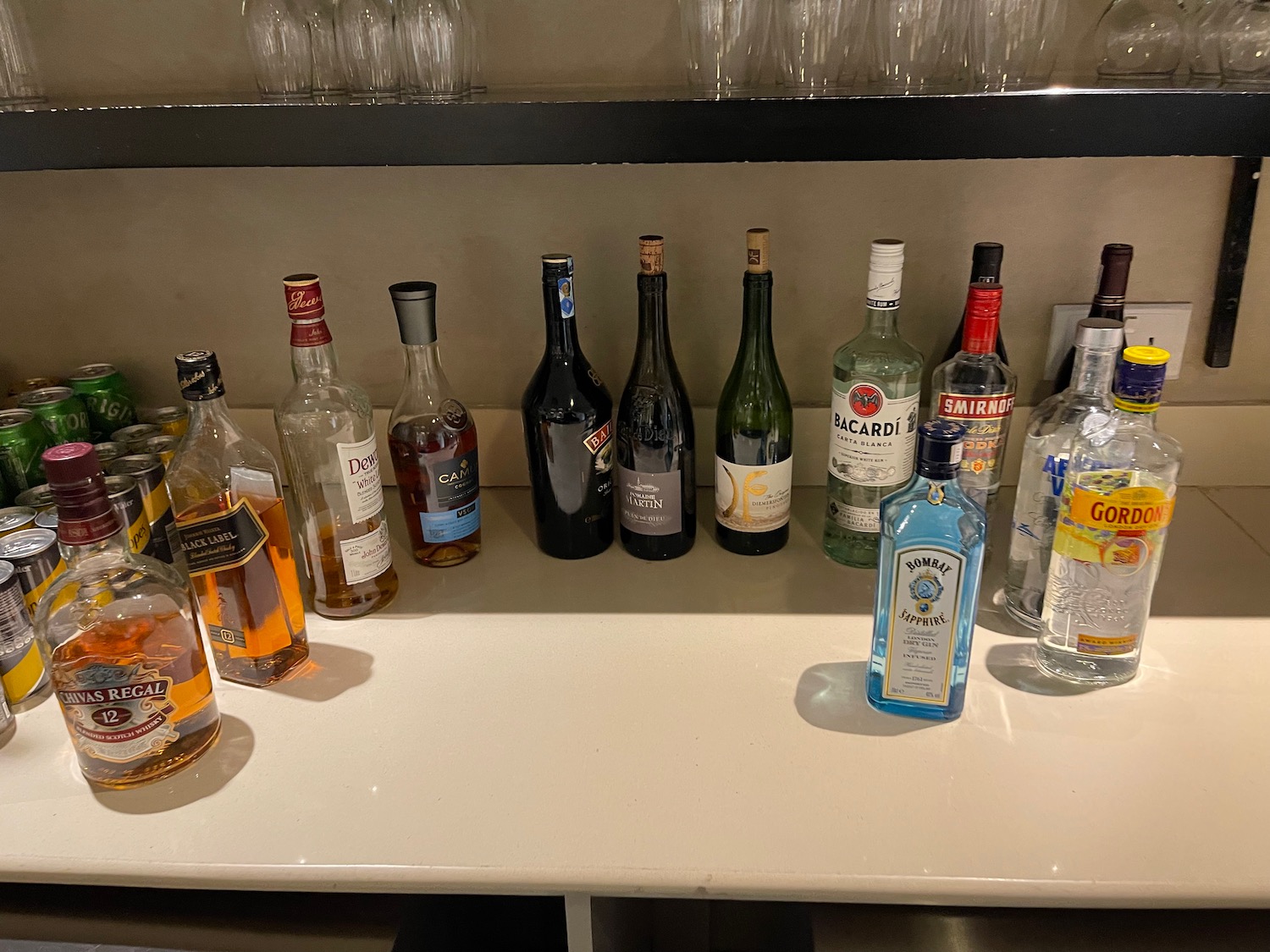 a group of bottles of alcohol on a counter