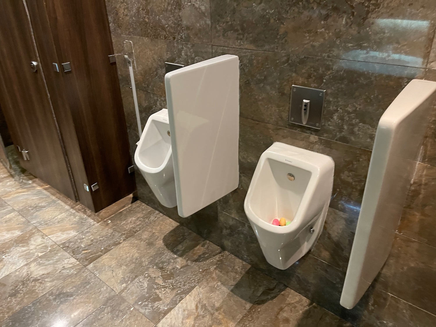 a urinals in a public bathroom