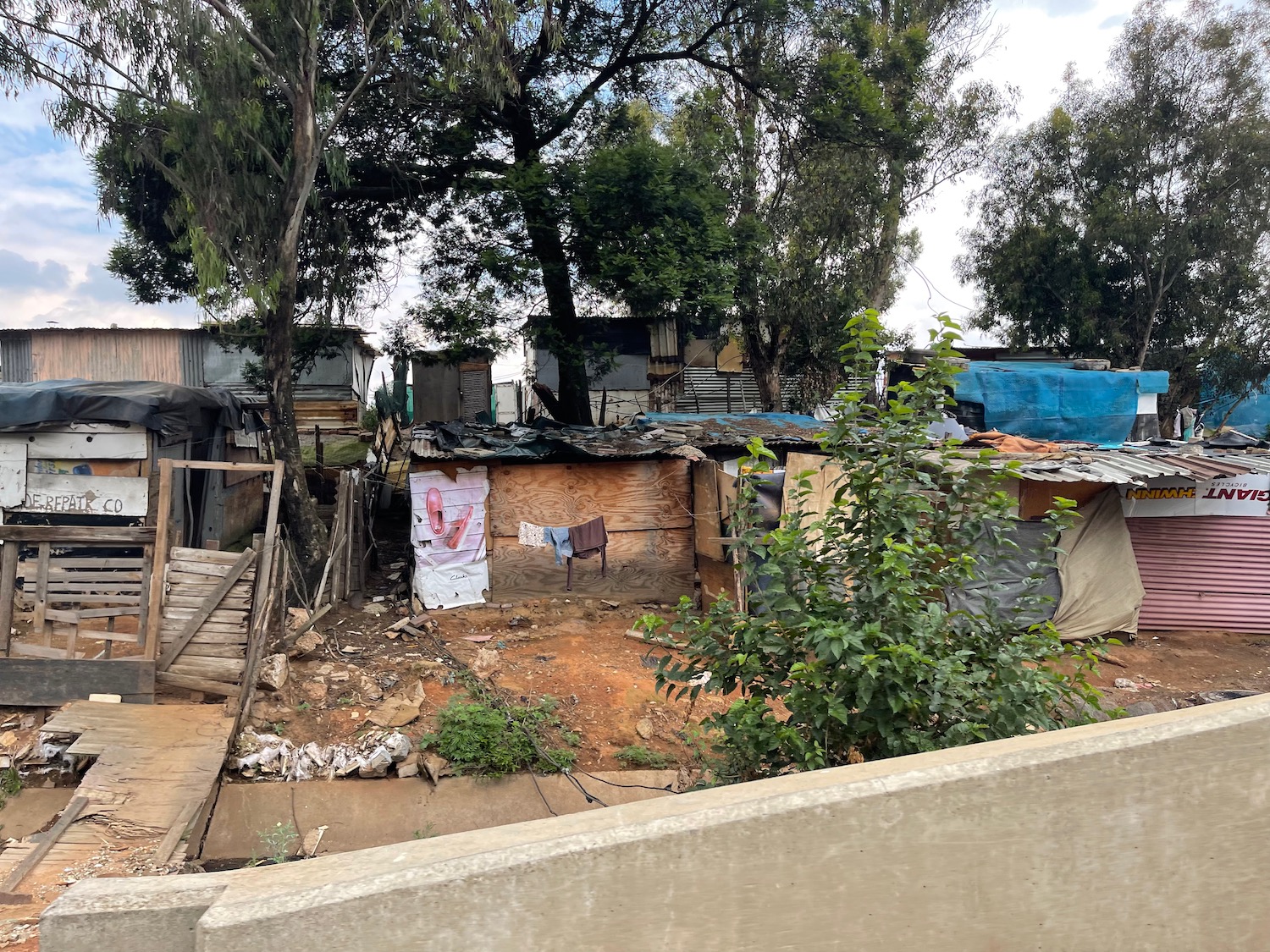 a group of shacks in a neighborhood