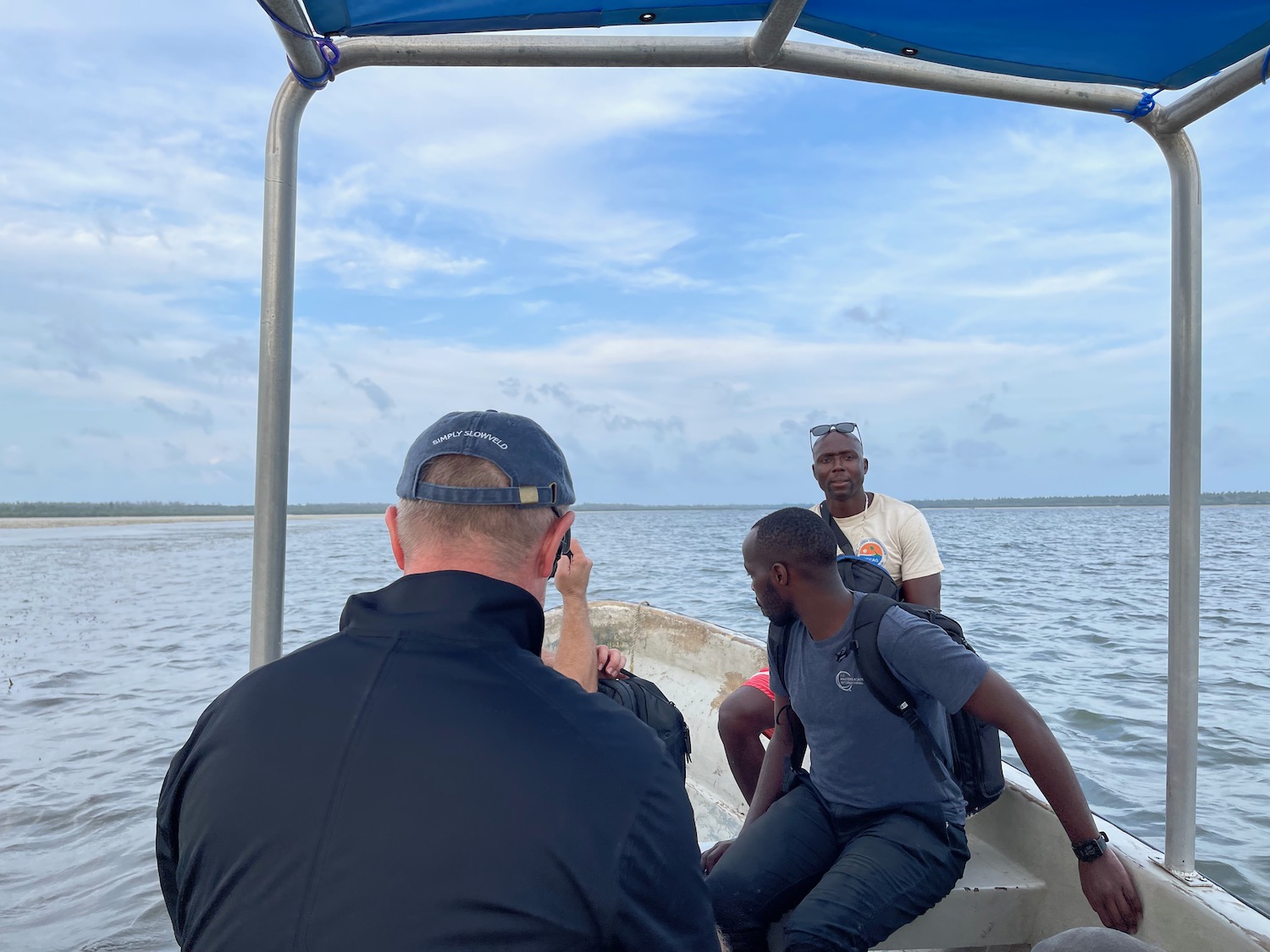 a group of men on a boat