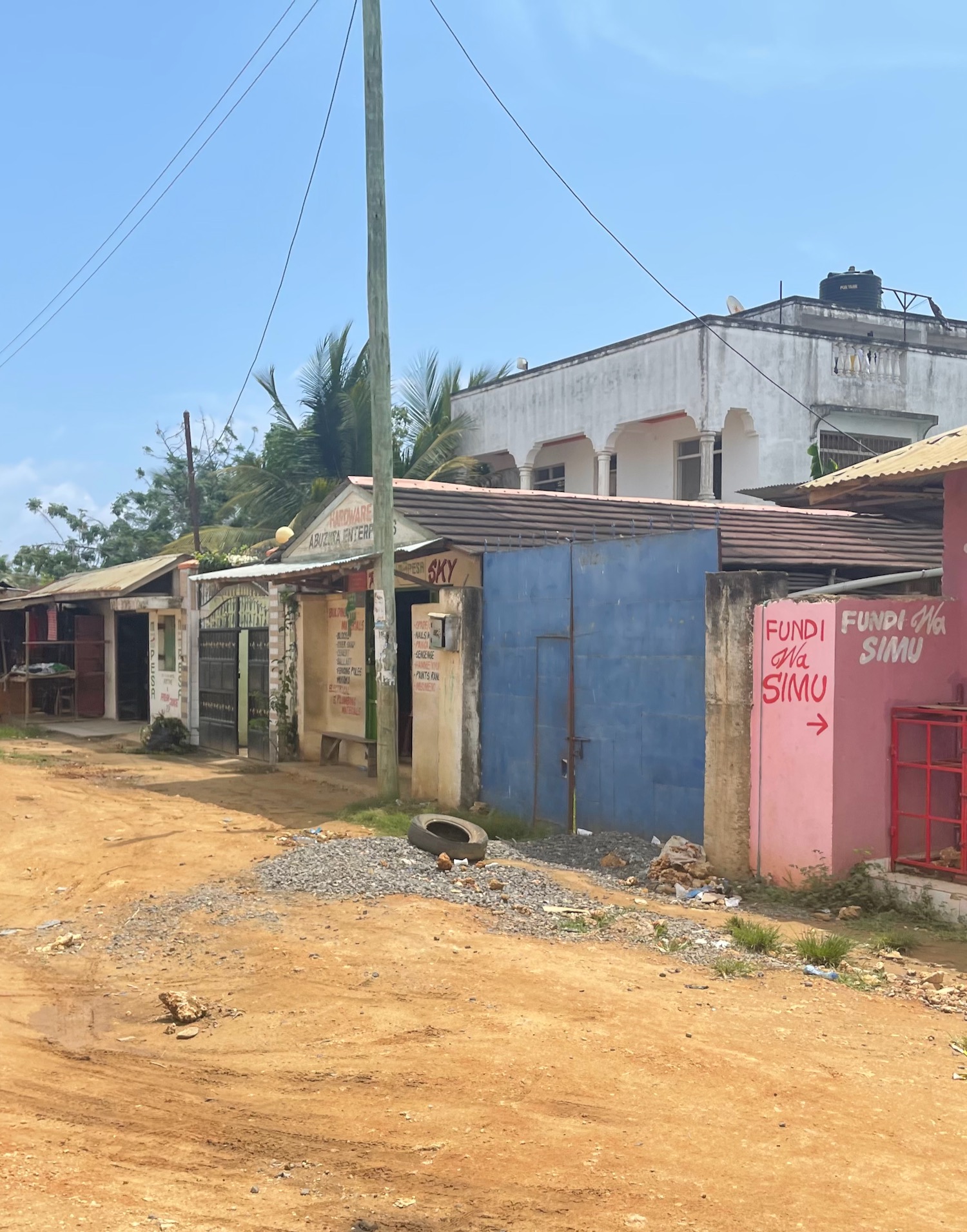 a row of buildings with graffiti on the side