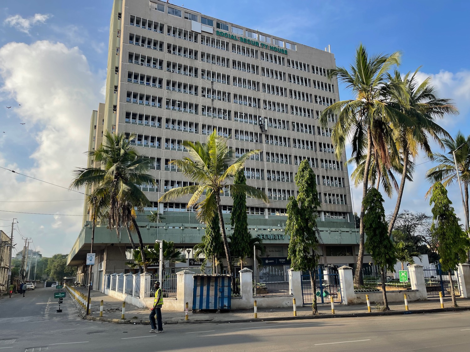 a building with palm trees