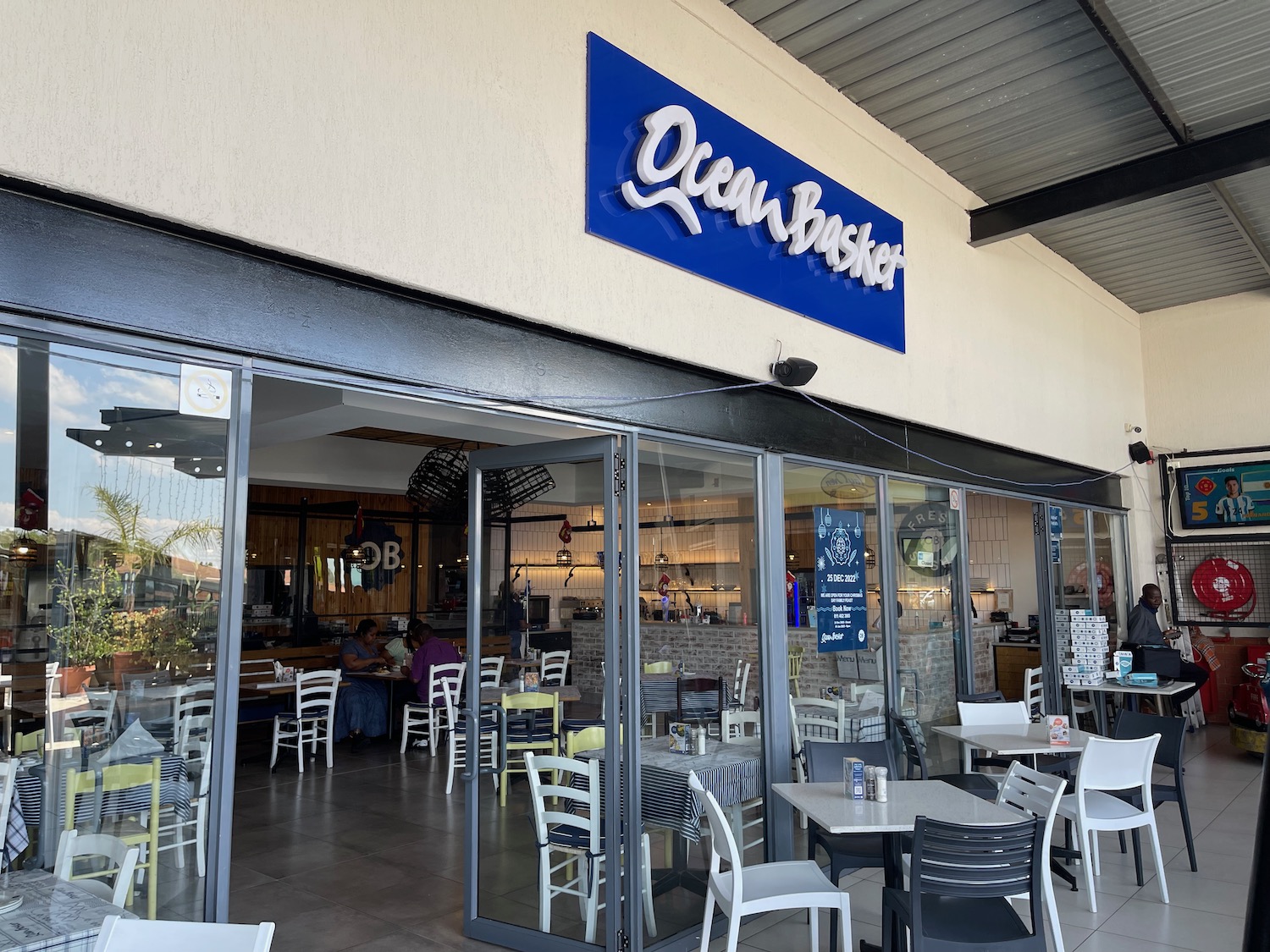 a restaurant with tables and chairs