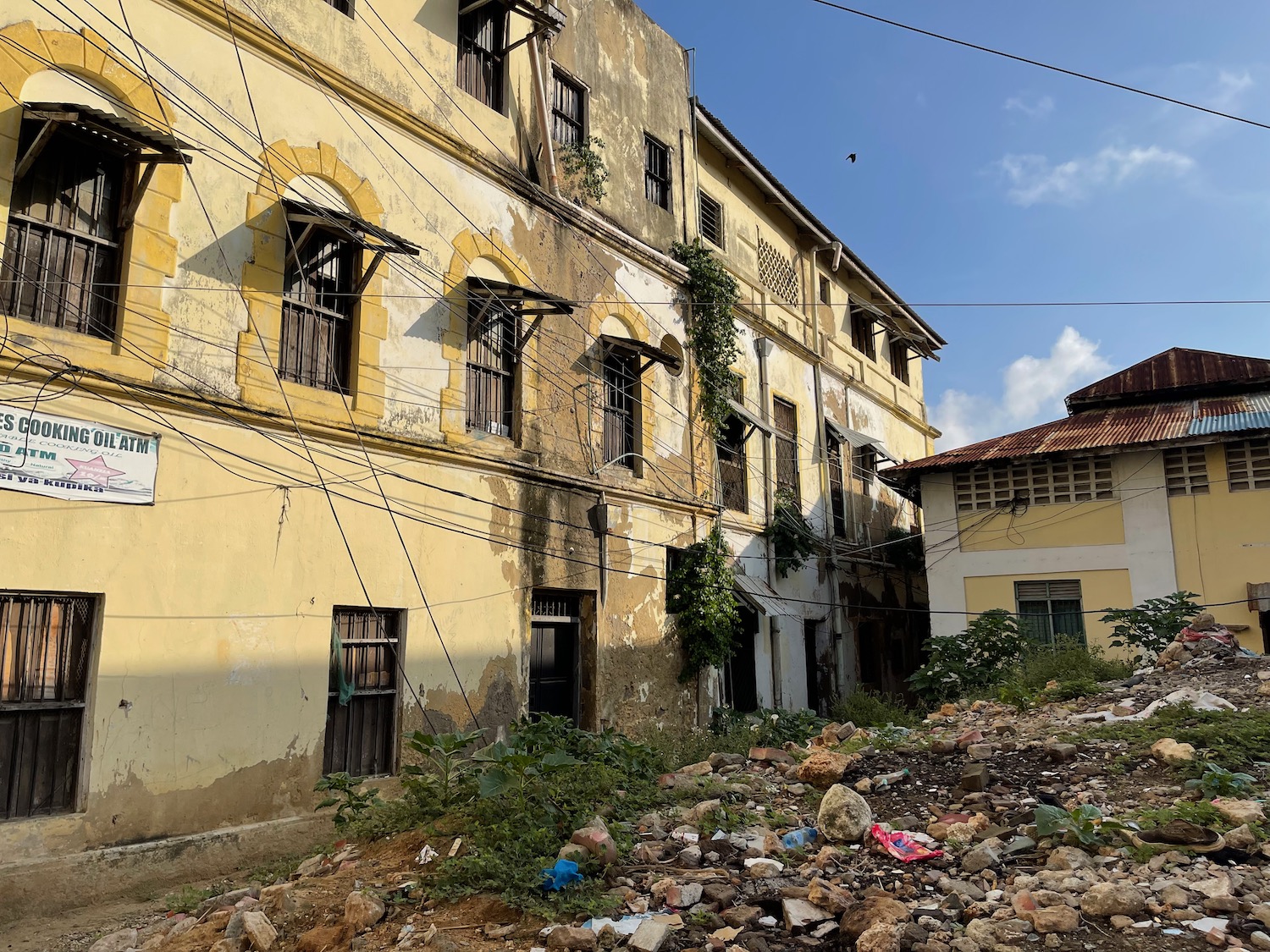 a building with a pile of garbage