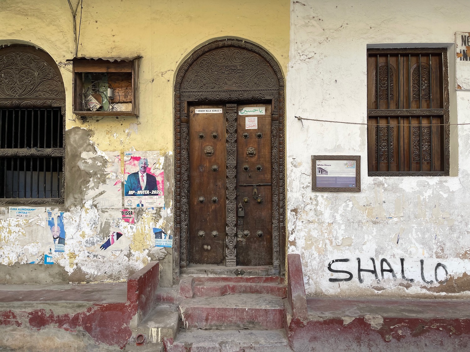 a door with a carved wooden frame