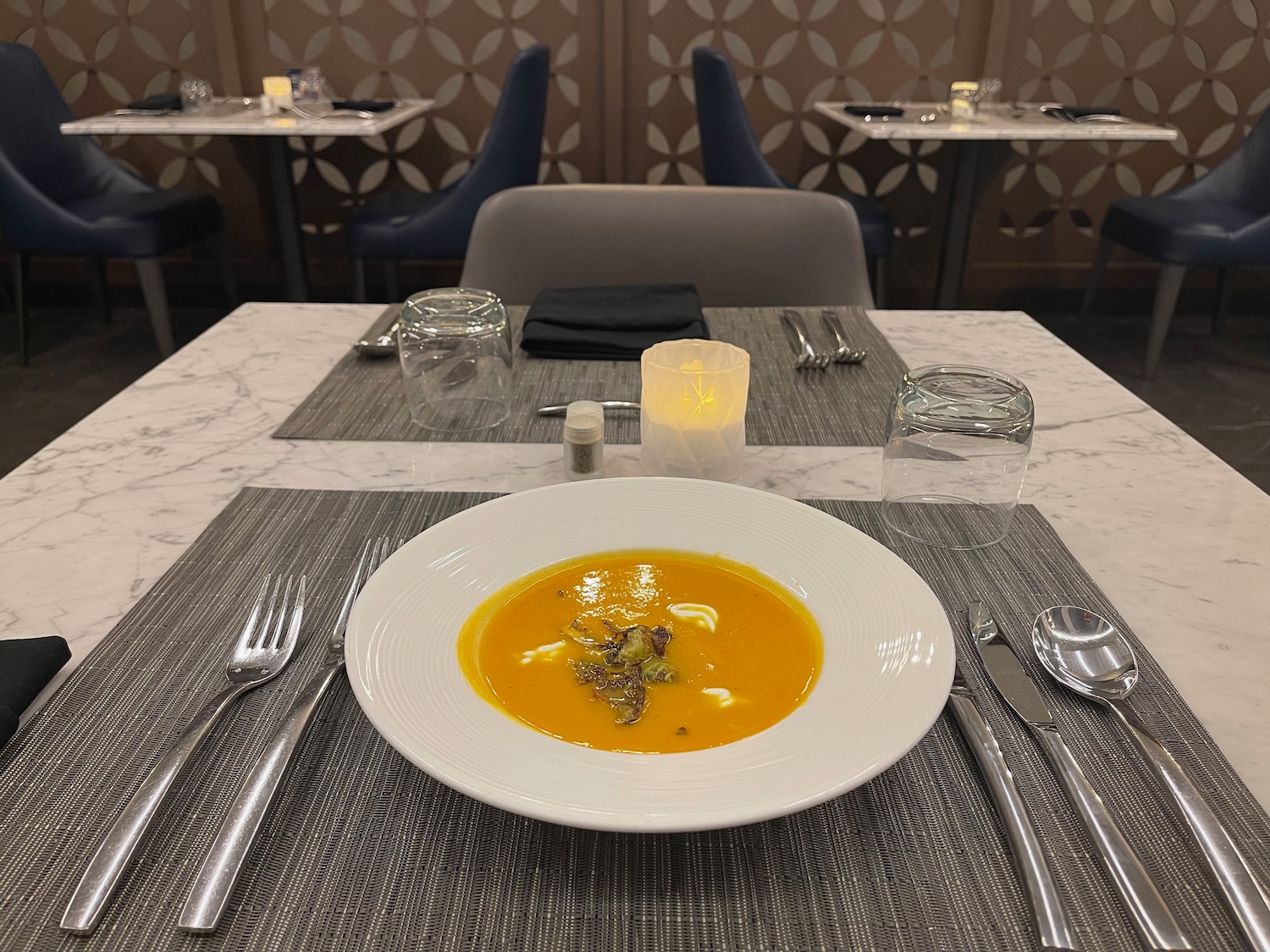 a plate of soup on a table