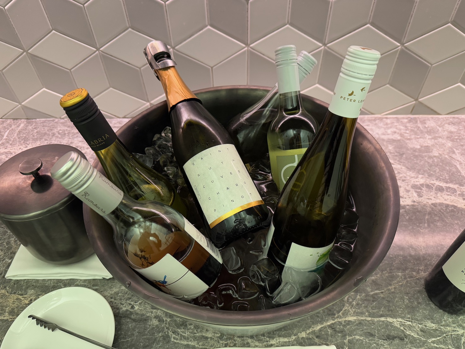 a bucket of wine bottles