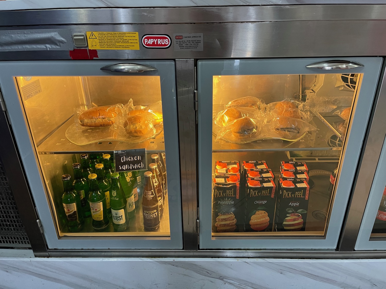 a refrigerator with food and drinks in it