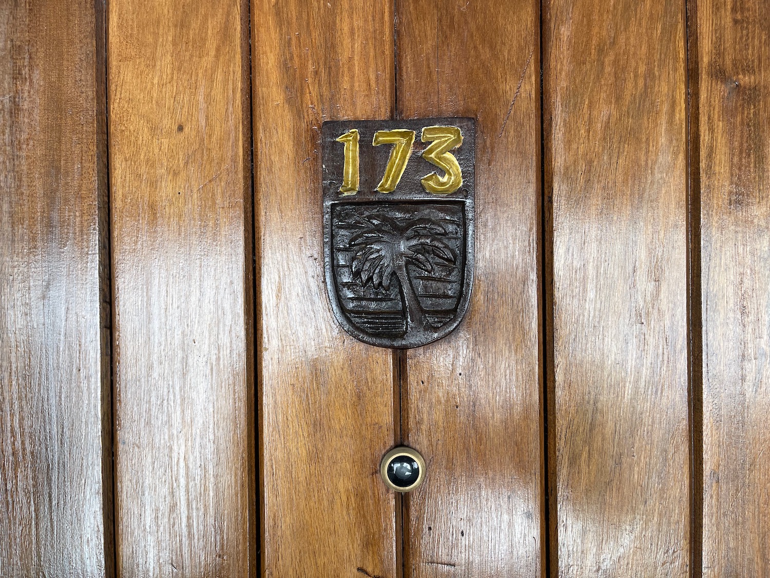 a door with a number and a keyhole
