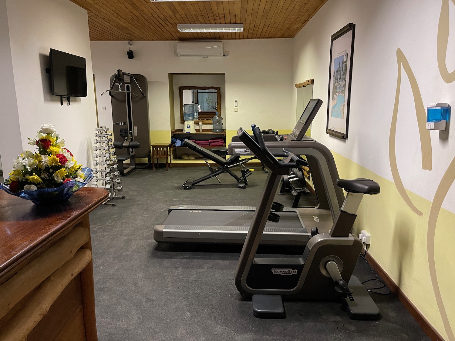 a room with treadmills and exercise equipment