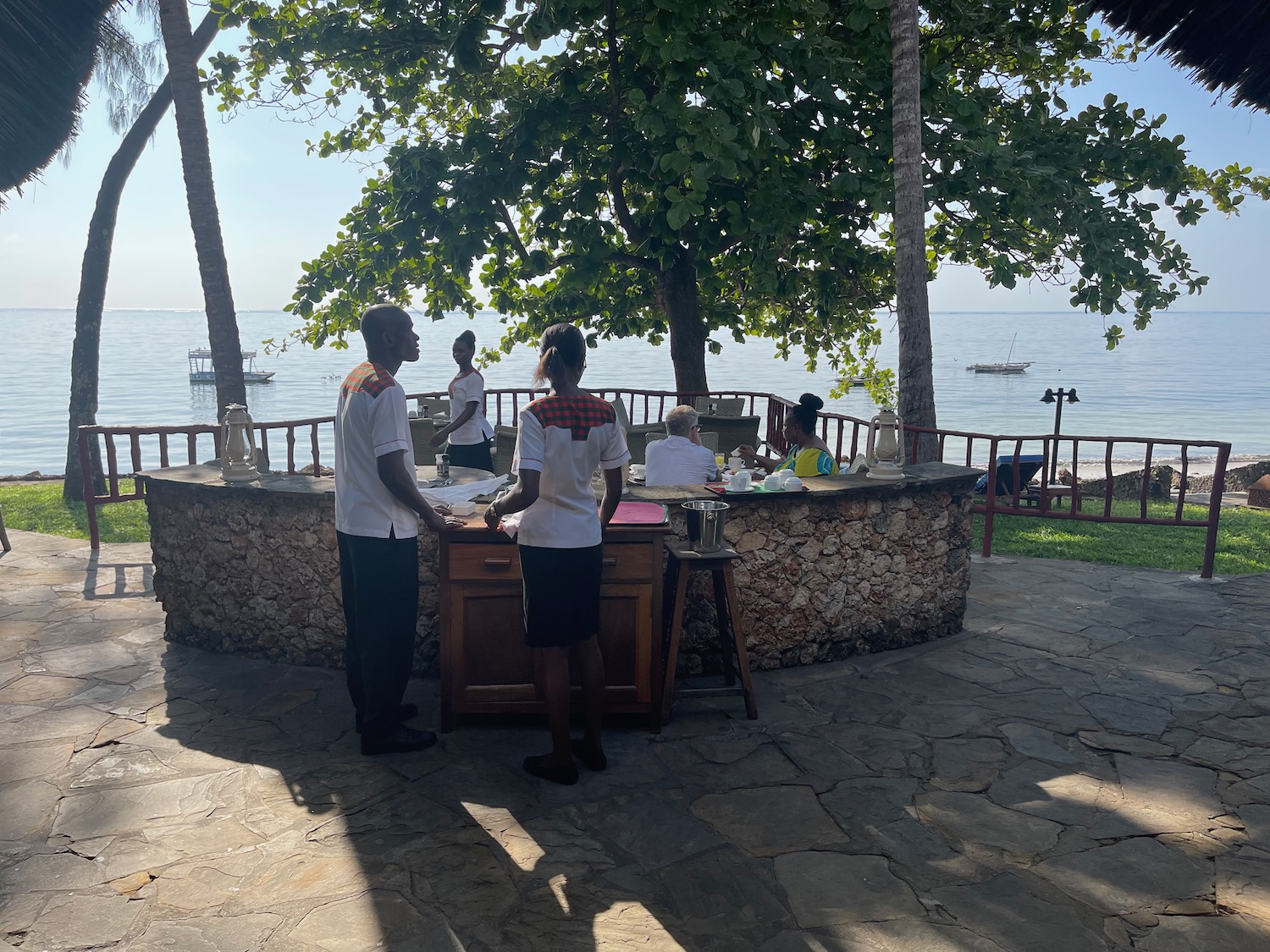 people standing in front of a bar