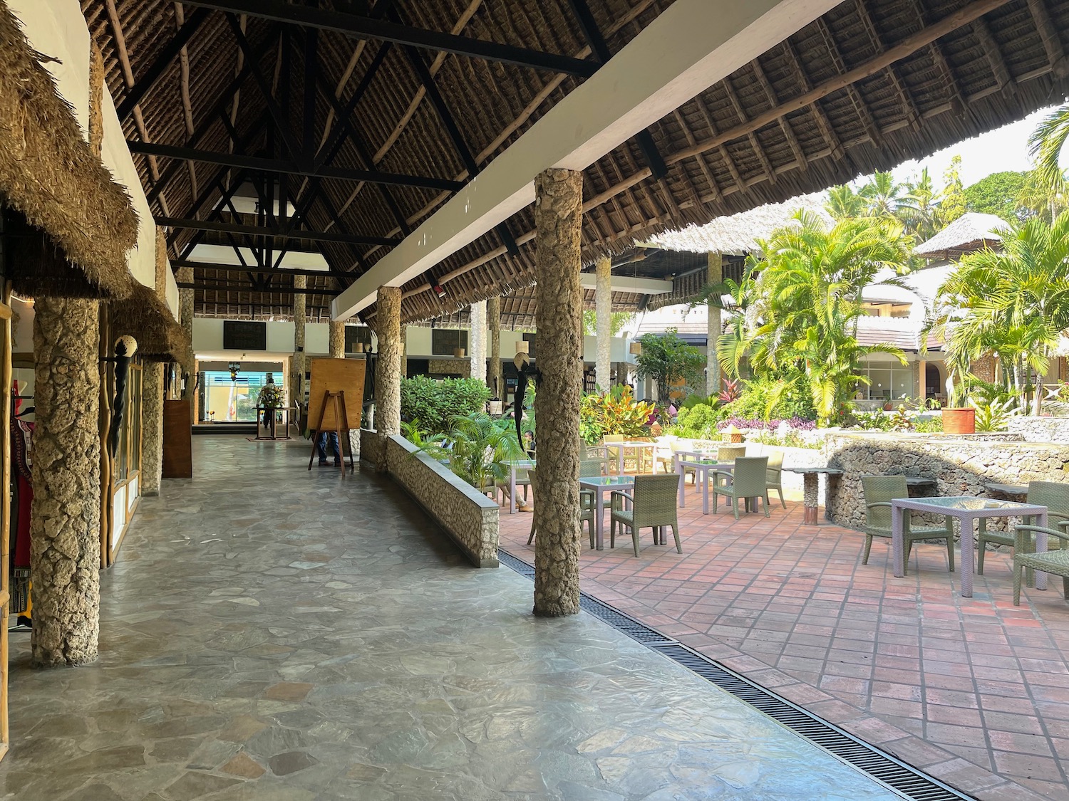 a building with a patio and tables