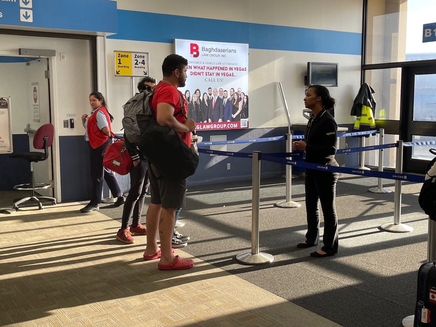 people standing in a line in a building