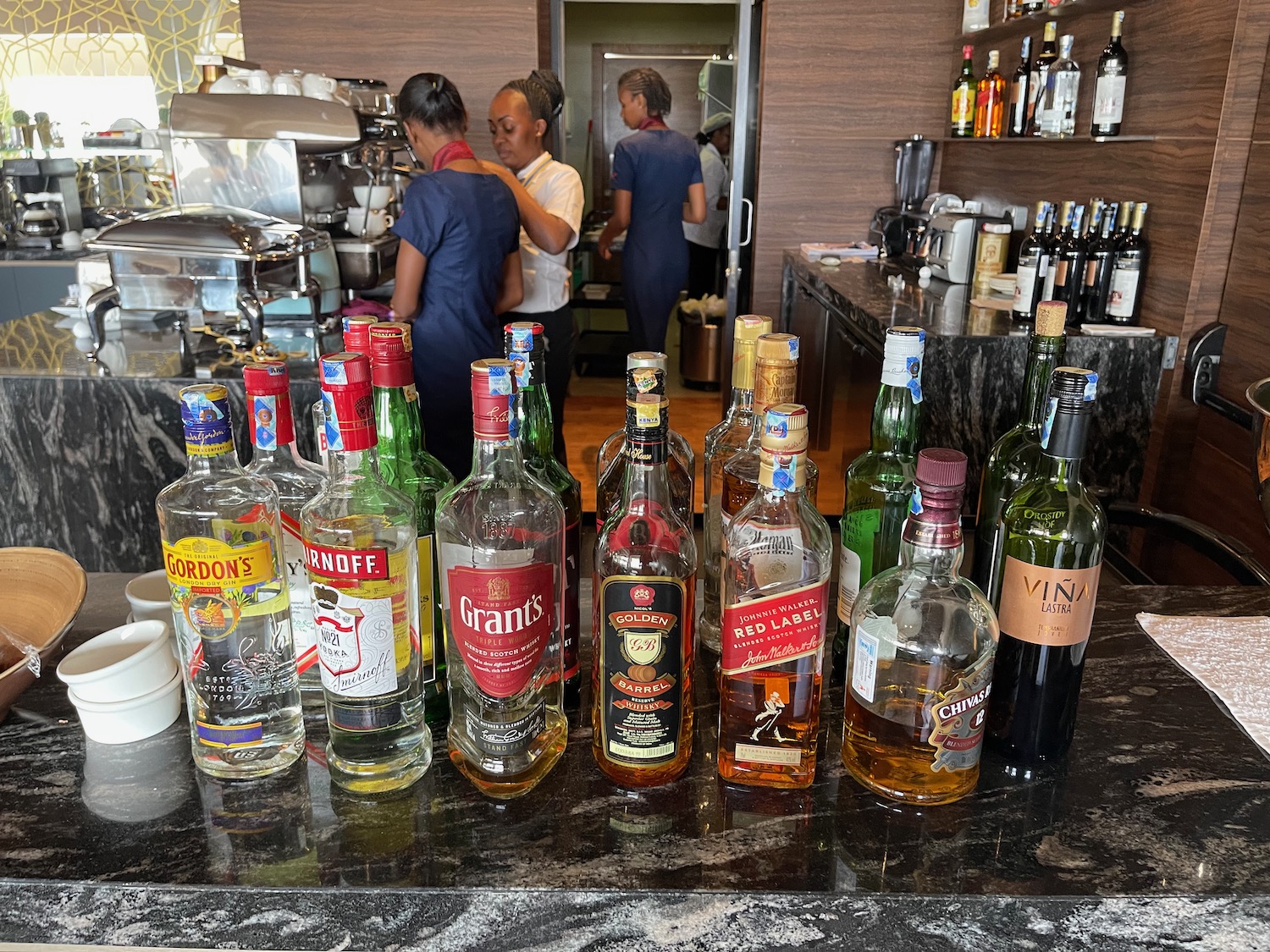 a group of bottles of alcohol on a counter