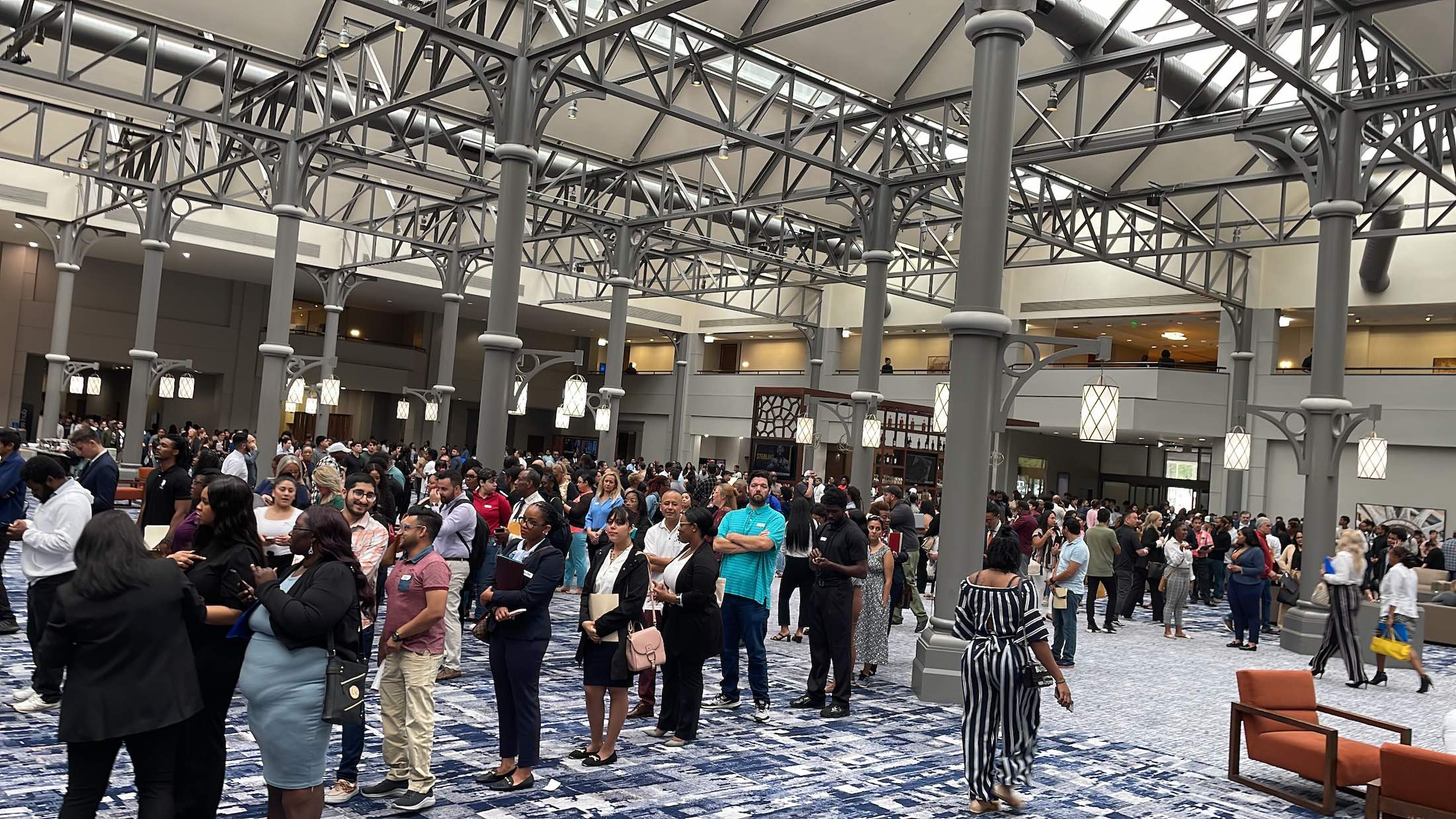 a large group of people in a large room