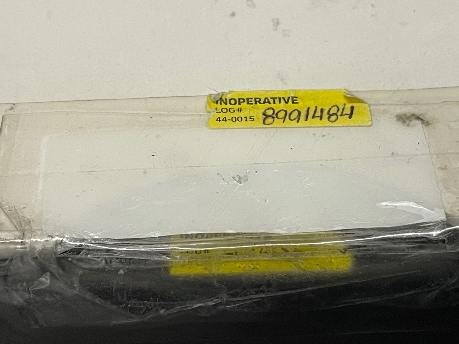 a plastic wrap with a yellow label