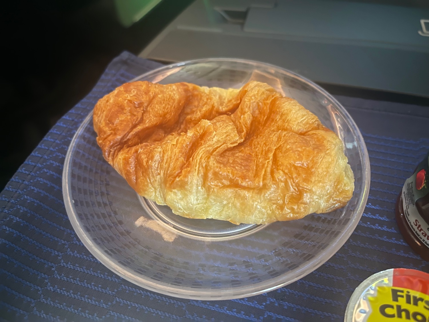 a croissant on a plate