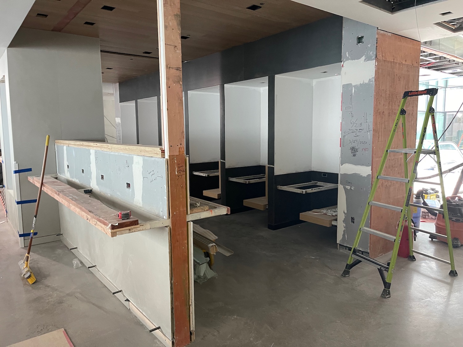 a bathroom under construction with a ladder