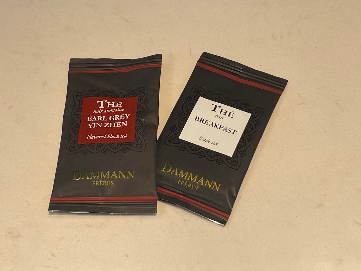 a black packets with red labels