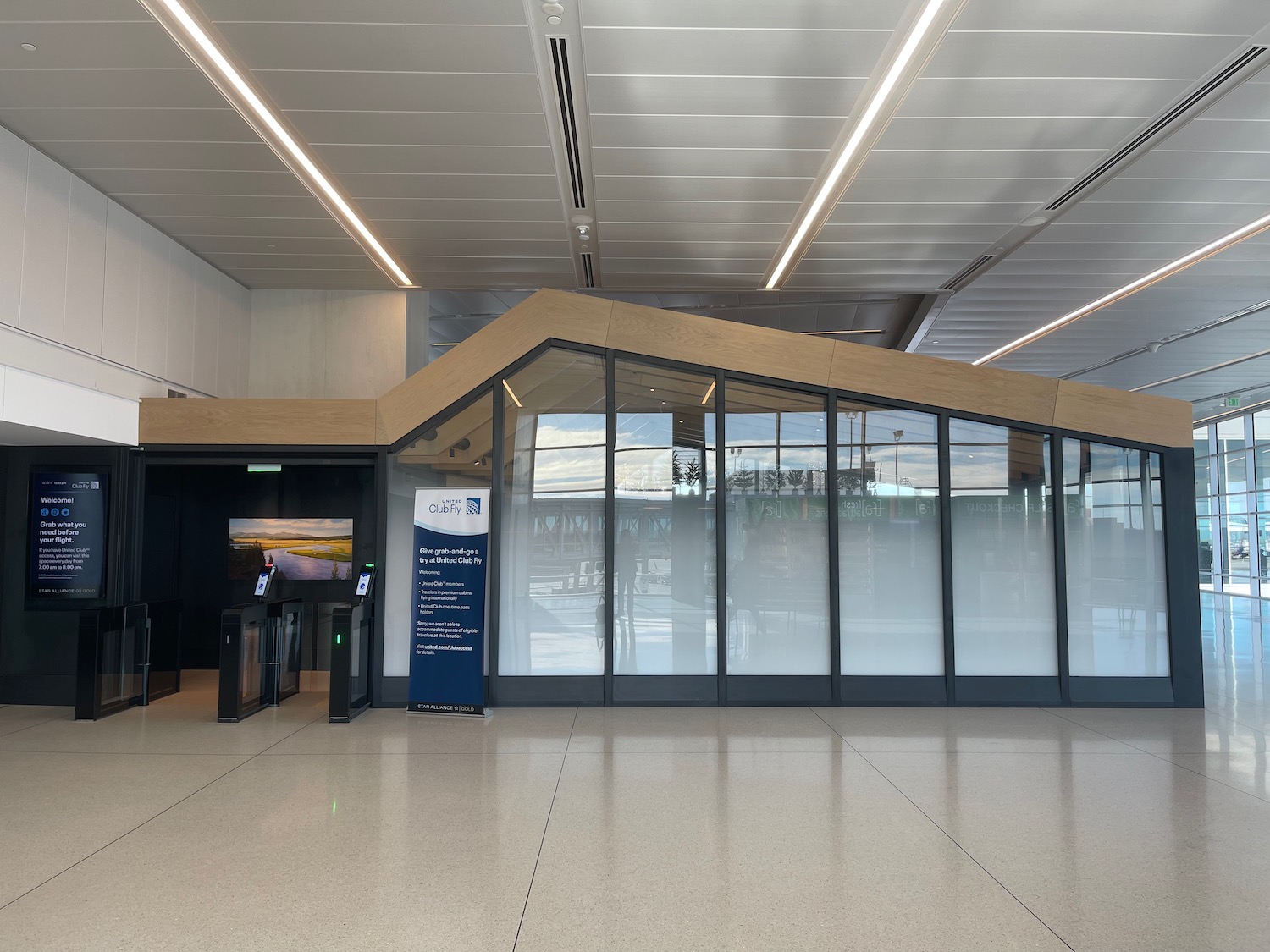 a building with glass walls and a door