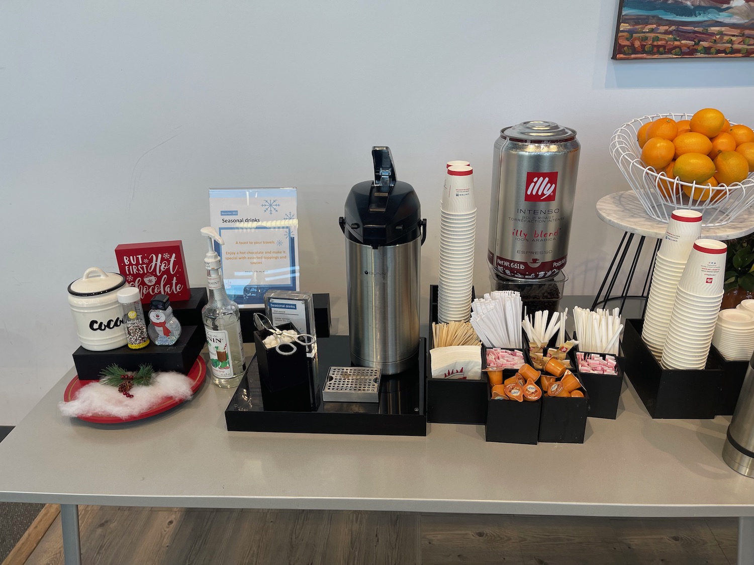 a table with a variety of drinks and beverages