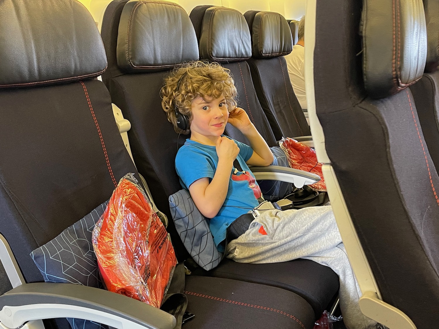 a boy sitting in a chair