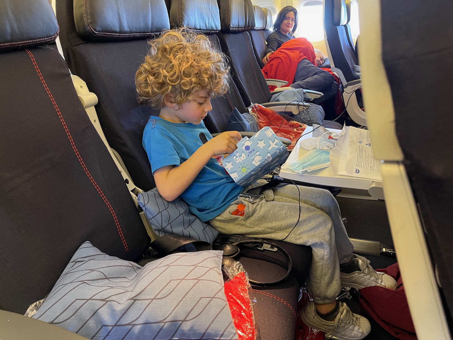 a child sitting in an airplane